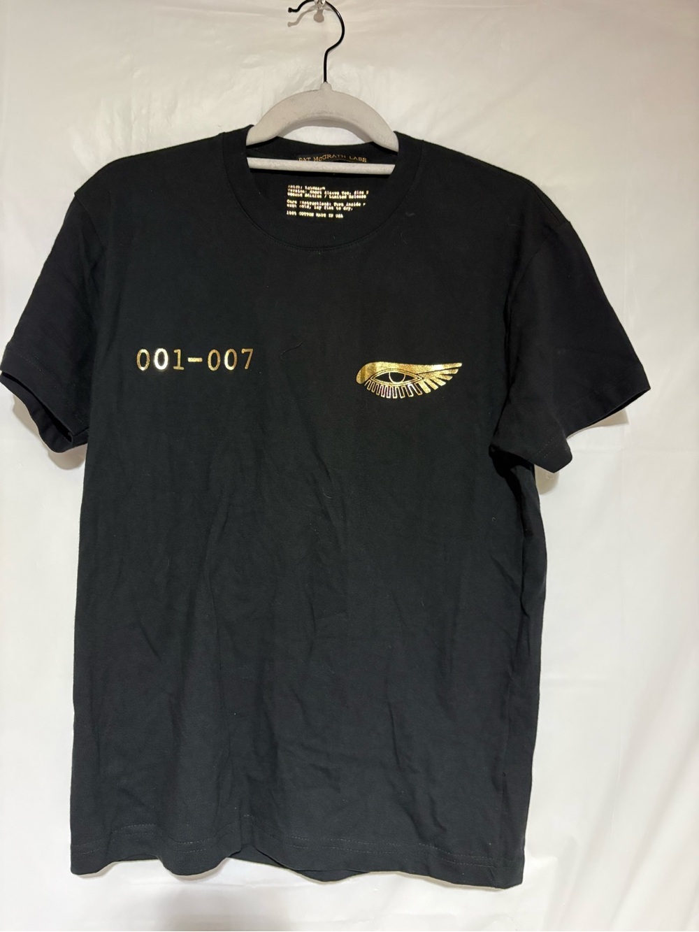 Pat McGrath Black Short Sleeve Tee with Gold Graphic